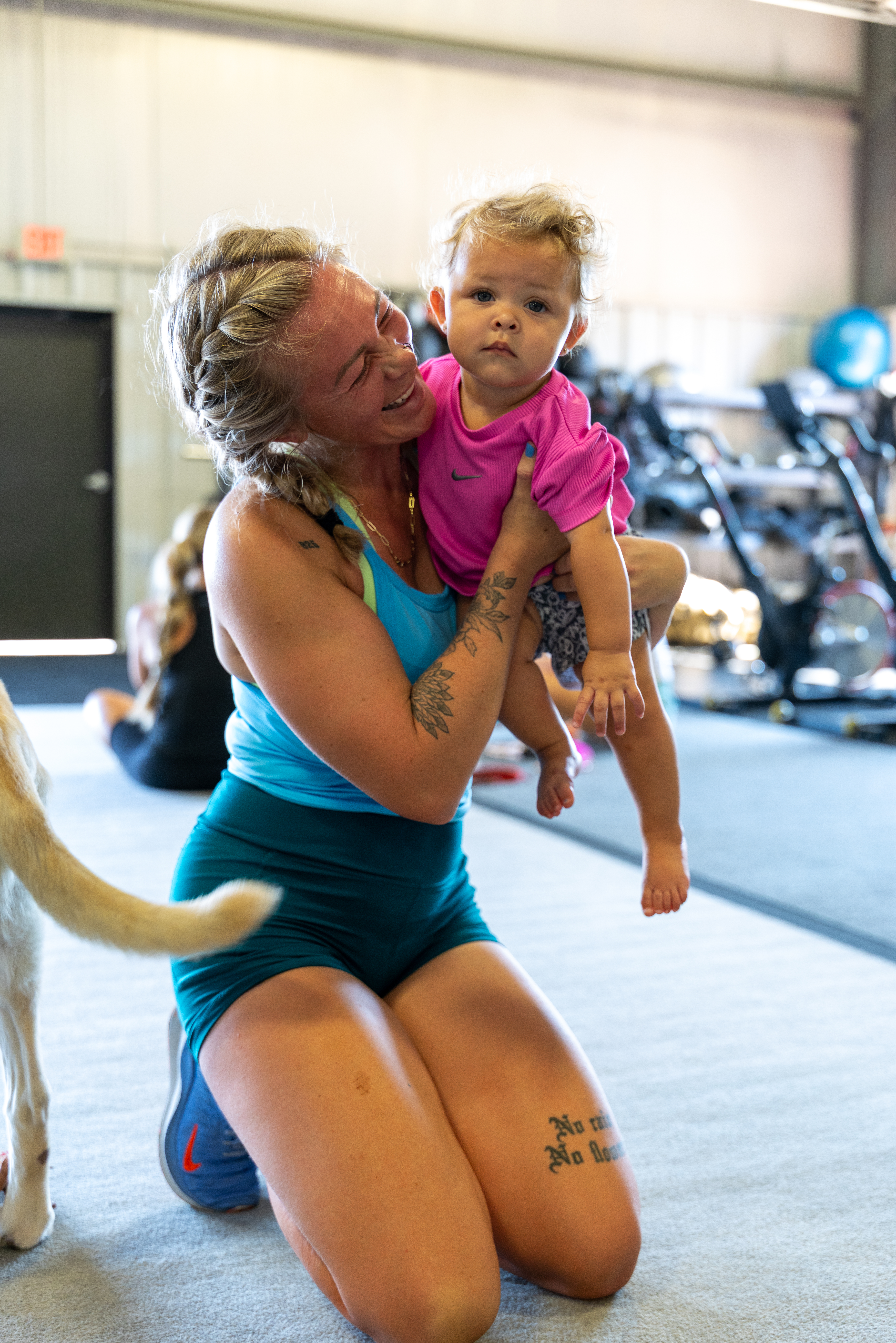 Families and kids in the free Gritty Kids childcare area at True Grit Fitness in Edmond, Oklahoma